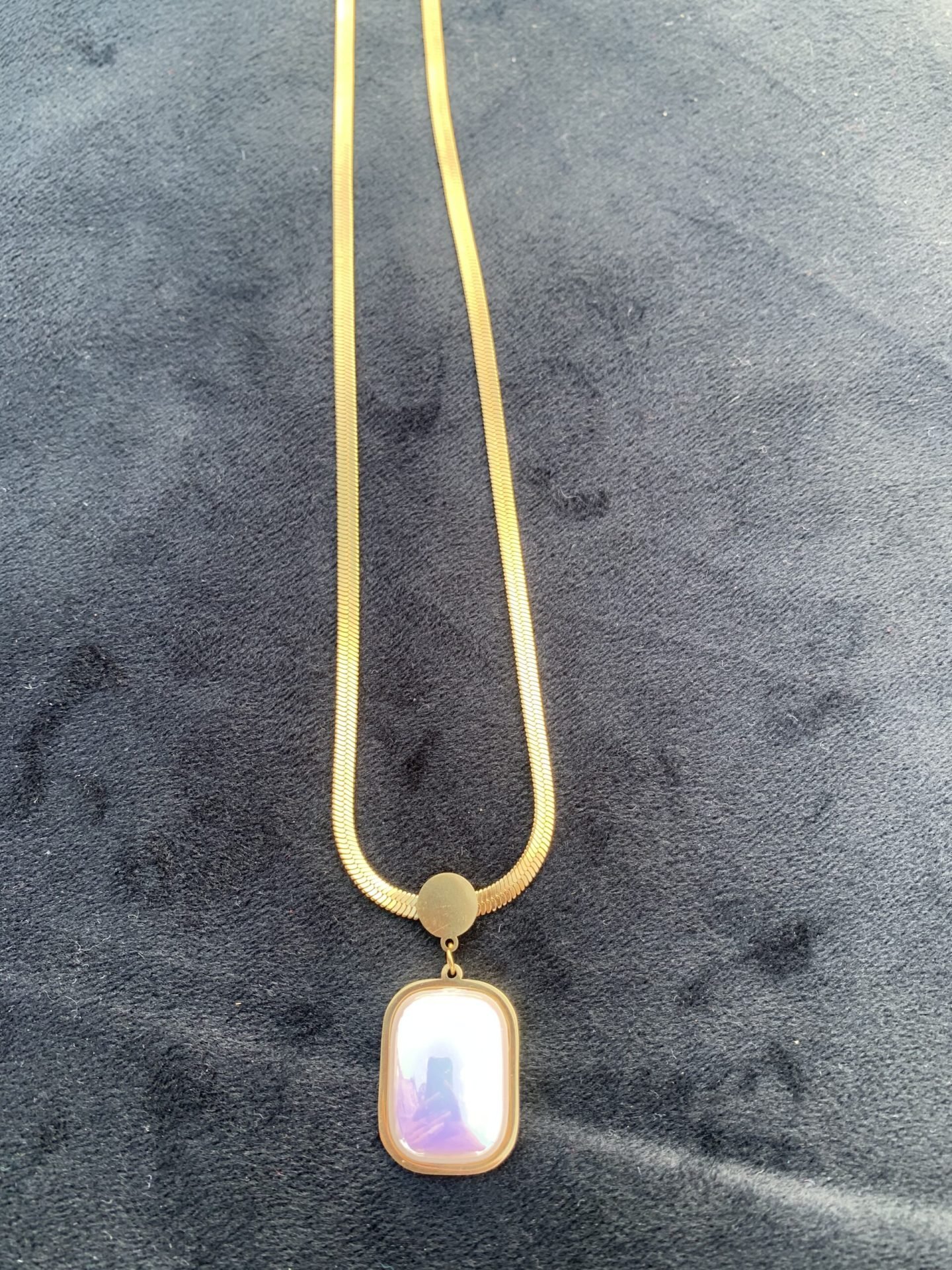 Golden Stone Pendant, worn